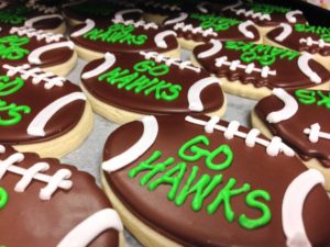 Watch the Seattle Seahawks games or grab a delicious treat from Sweet Themes Bakery in Kent, Washington