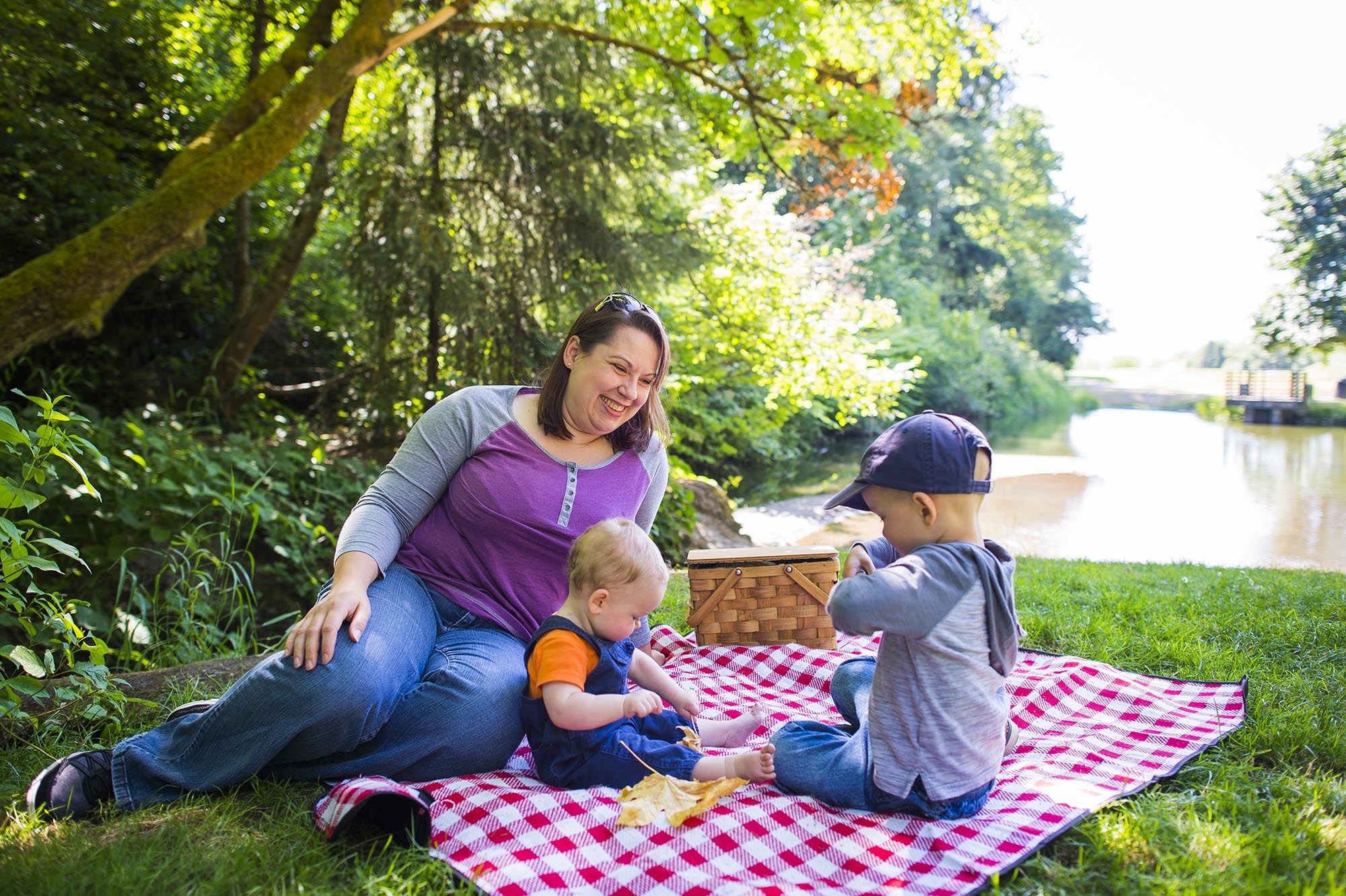 Family picnicking at Mill Creek Canyon Earthworks Park in Kent, Washington