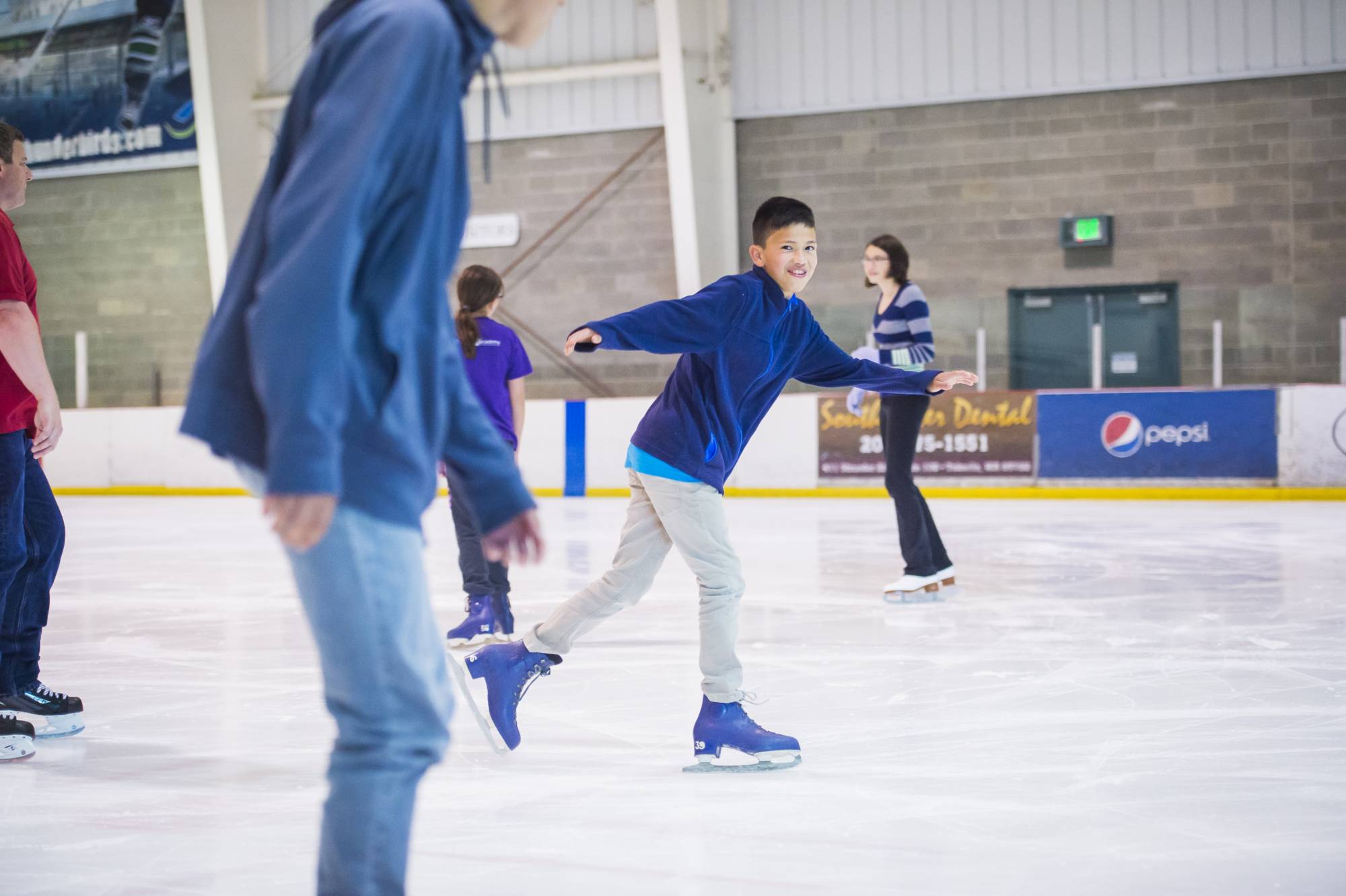 Ice skaters at Kent Valley Ice Centre in Kent, Washington