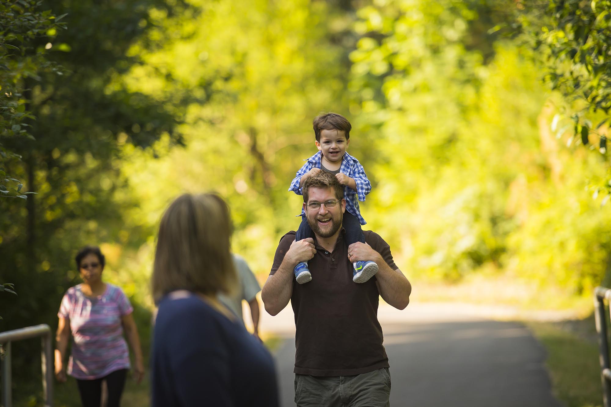 Family walking on Soos Creek Trail in Kent, Washington