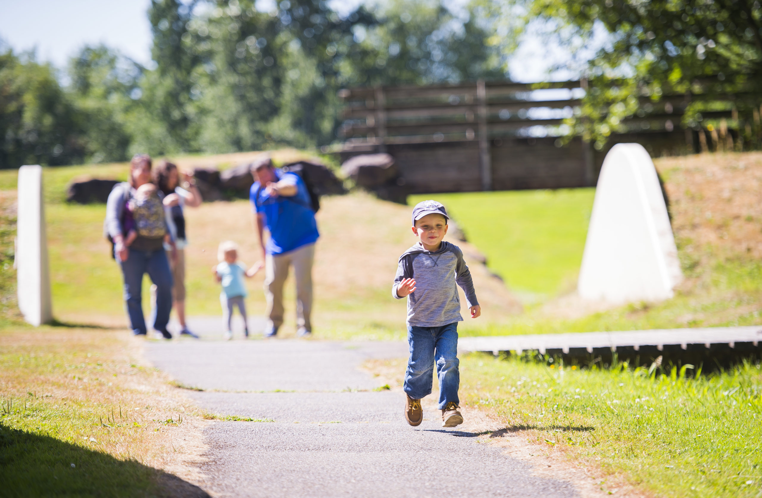 Family walking at Earthworks Park in Kent, Washington