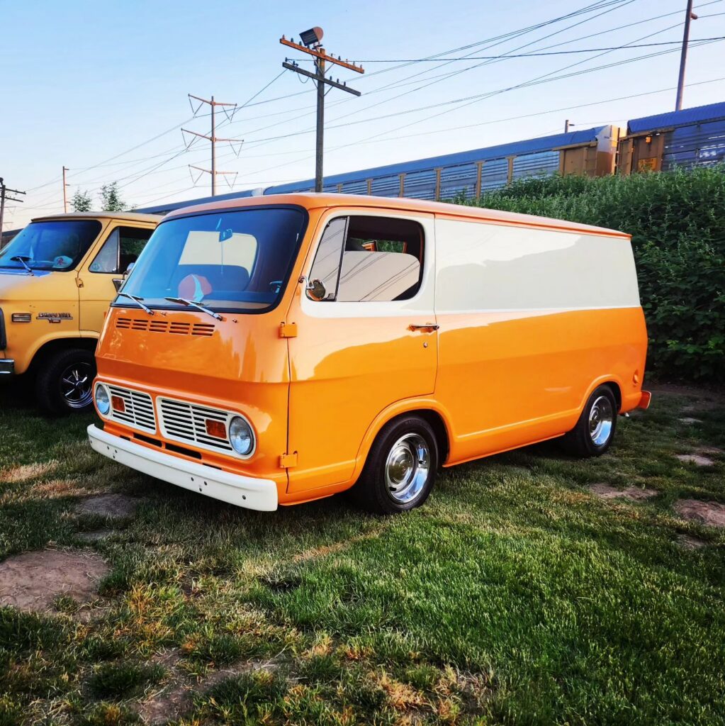 Photo of an orange classic van at Binford Metals Field of Dreams in Kent, Washington