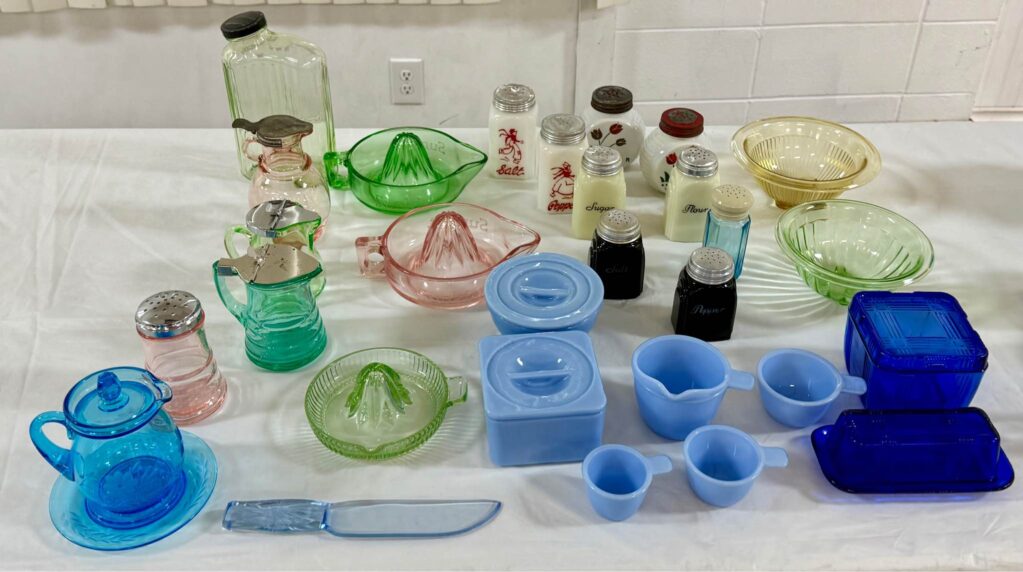 photo of beautiful green and blue and pink antique glassware