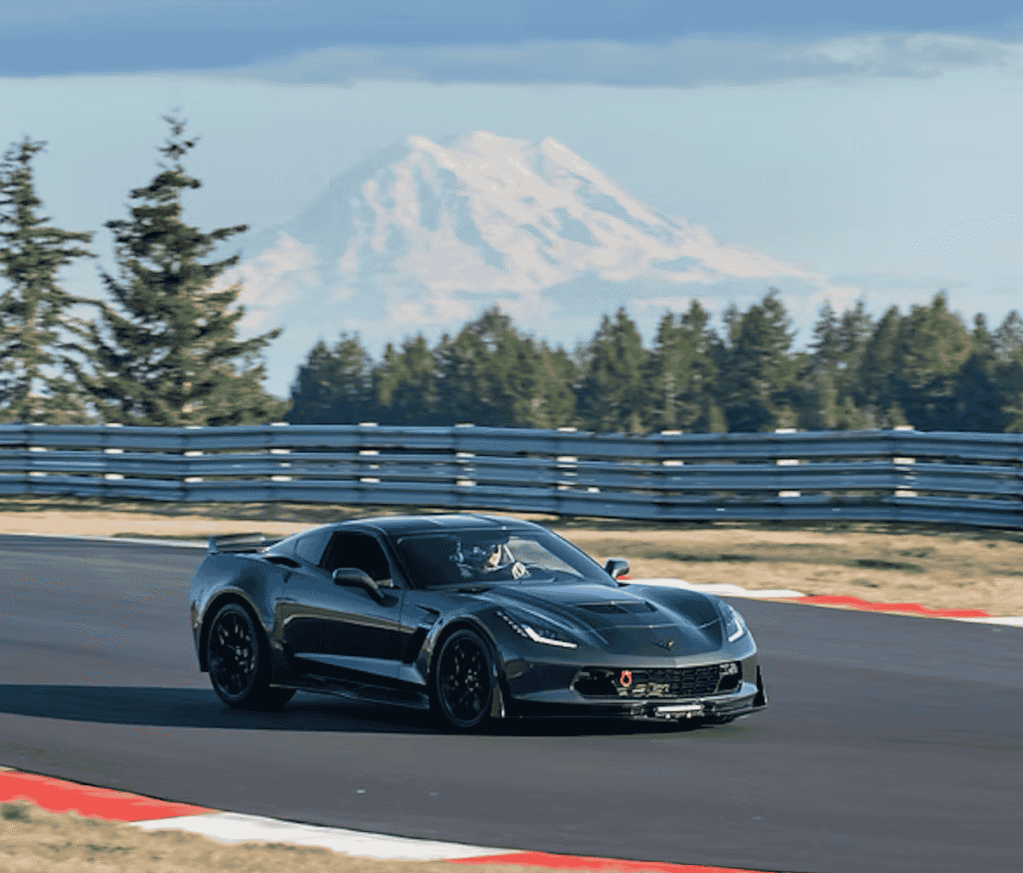 Picture of a Chevy Corvette racing around Pacific Raceways in Kent, WA